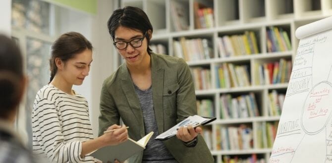teacher assisting a student in class